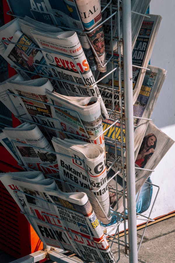 Newspaper stand on city sidewalk